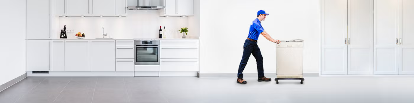 1800-GOT-JUNK? Truck Team Member hauling away a dishwasher