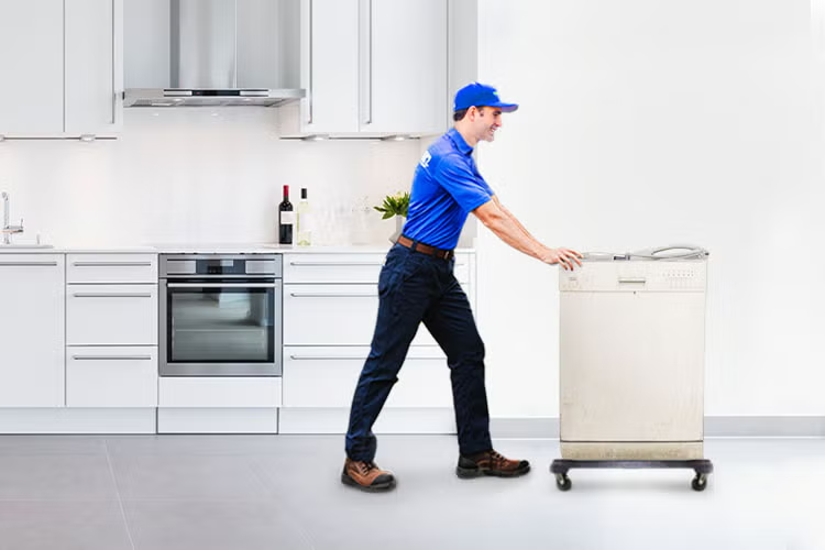 1800-GOT-JUNK? Truck Team Member hauling away a dishwasher