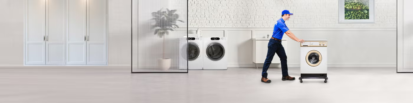 1800-GOT-JUNK? Truck Team Member hauling away a washer