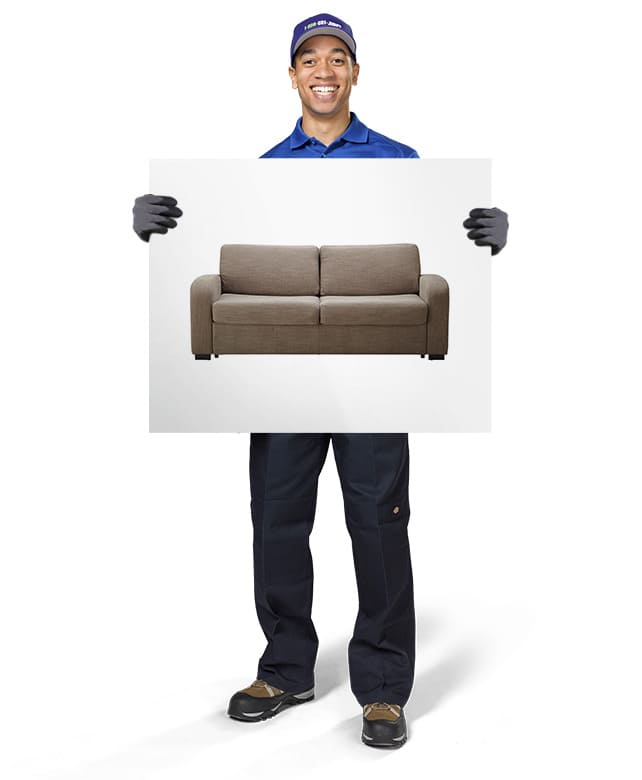 1-800-GOT-JUNK? Truck Team Member holding an image of a loveseat