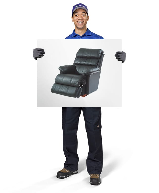 1800-GOT-JUNK? Truck Team Member holding an image of a recliner