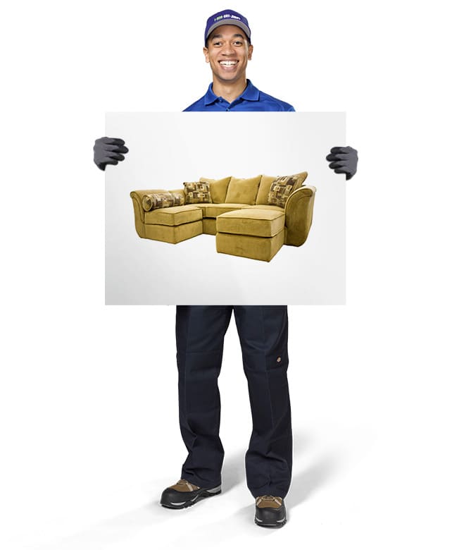 1800-GOT-JUNK? Truck Team Member holding an image of a sectional couch