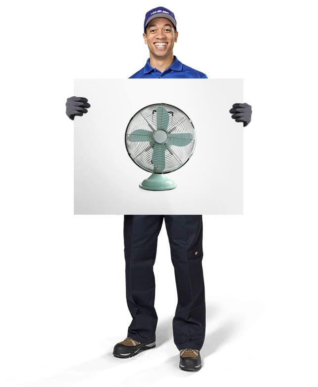 1800-GOT-JUNK? Truck Team Member holding an image of a fan