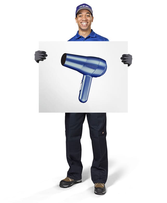1800-GOT-JUNK? Truck Team Member holding an image of a hair dryer